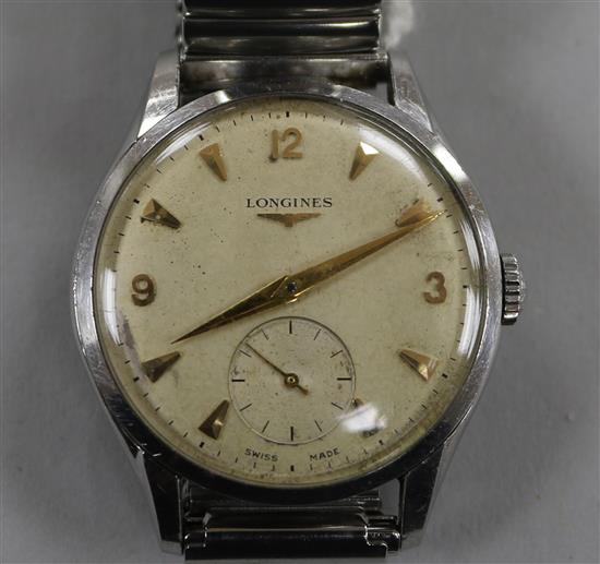 A gentlemans 1950s? stainless steel Longines manual wind wrist watch,